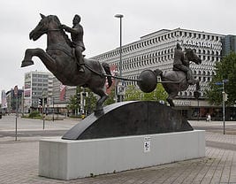 An image showing 2 horses trying to pull Magdeburg Hemispheres apart.